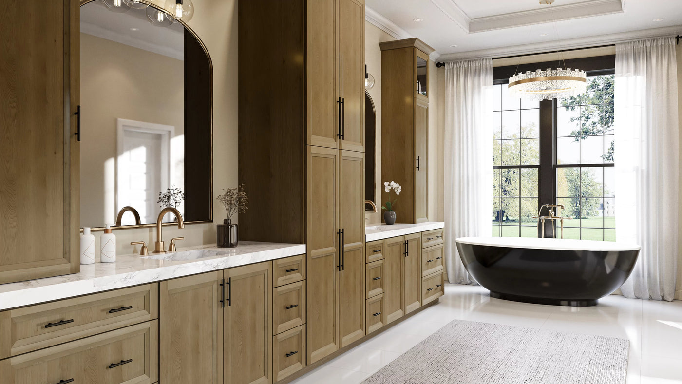Oxford Toffee Cabinets in elegant tiled bath with free standing tub and brass mirrors
