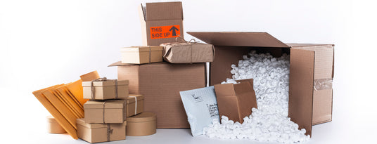 boxes and packages arranged on white background