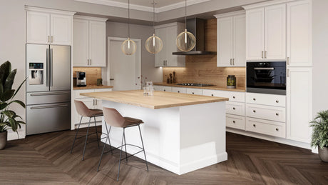 Luxor Shaker Shite Cabinets with slab drawer fronts and wooden countertops