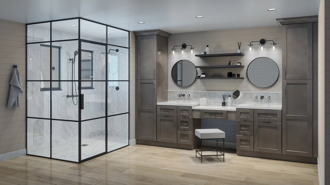 Modern shaker cinder bathroom with glass shower enclosure, vanity, and mirrors.